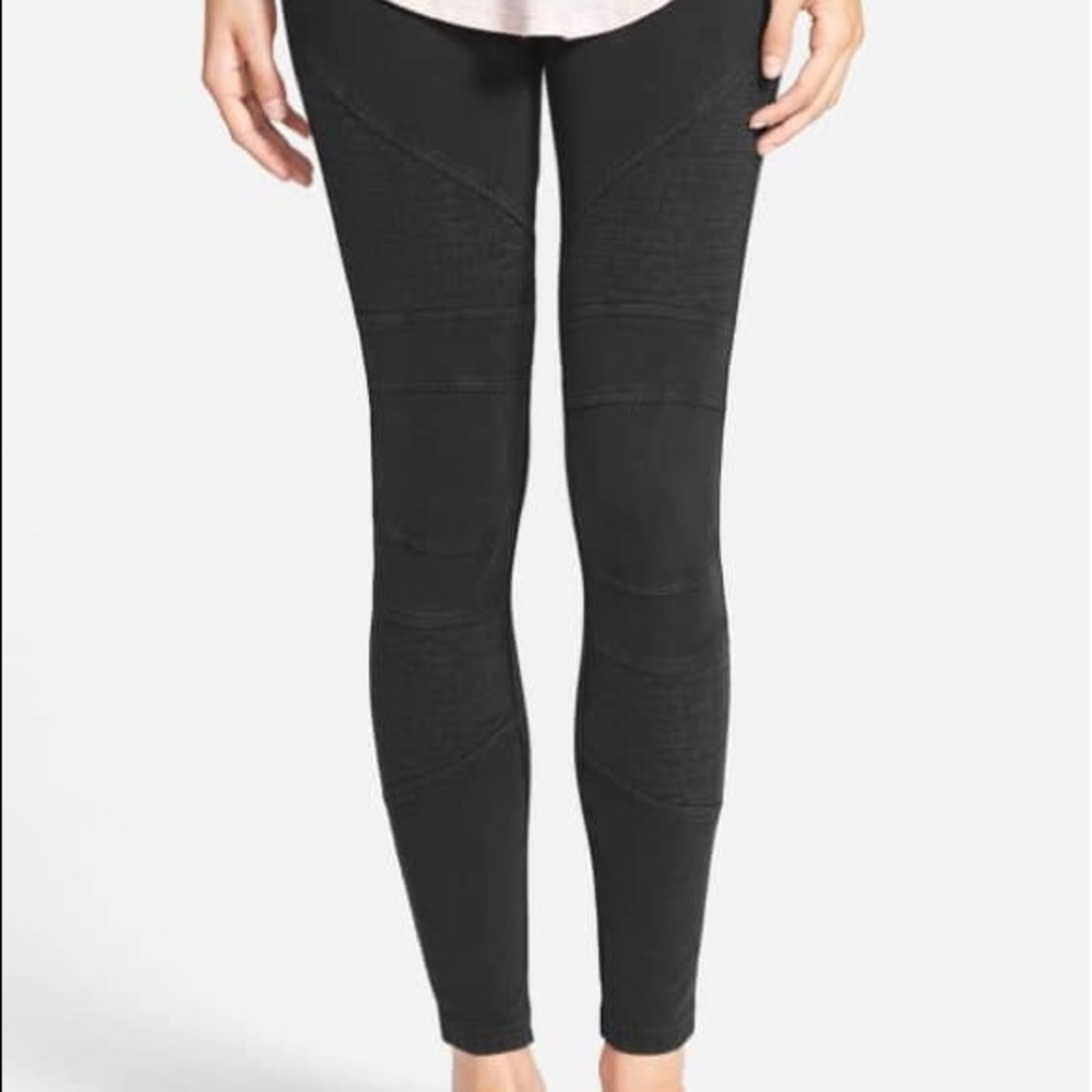 Black stone washed moto jeggings.